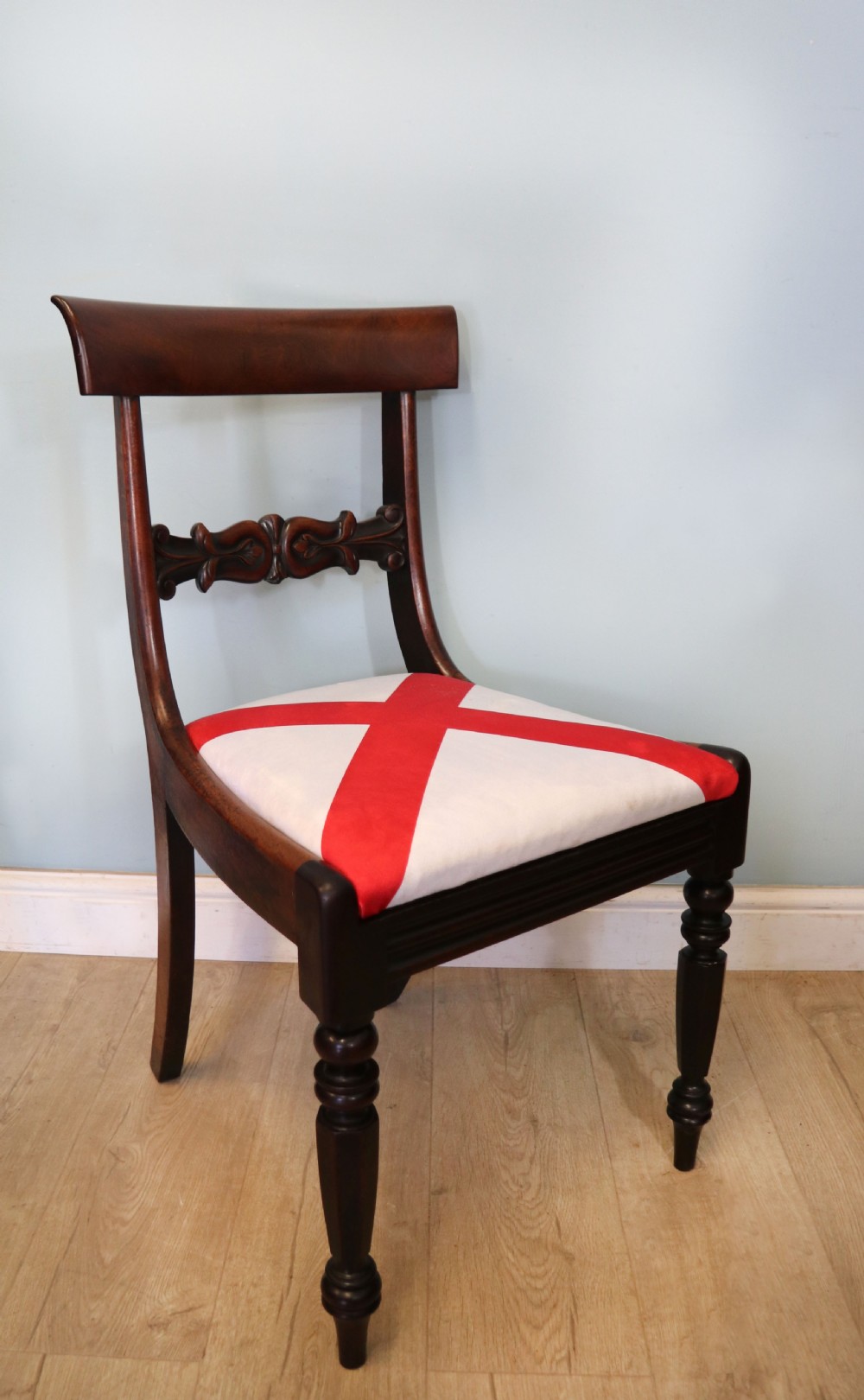 A set of four Victorian mahogany bar-back dining chairs with carved mid-rails, turned front legs, and flag-patterned upholstered seats. View XI