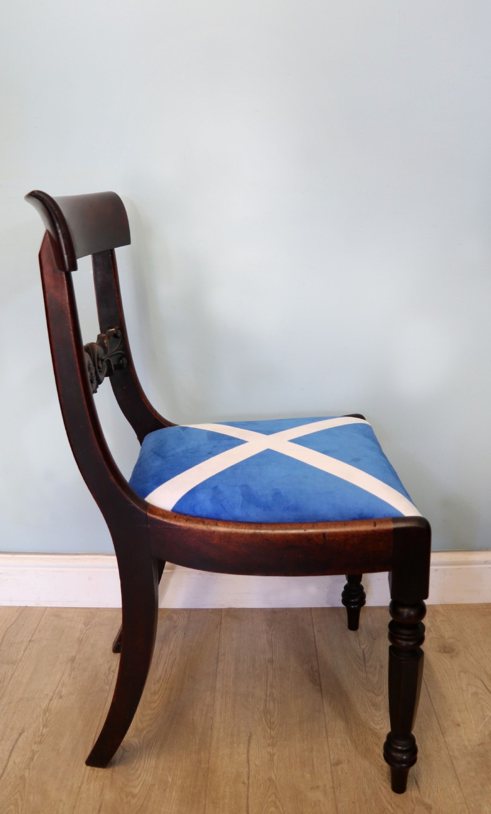 A set of four Victorian mahogany bar-back dining chairs with carved mid-rails, turned front legs, and flag-patterned upholstered seats. View XIX