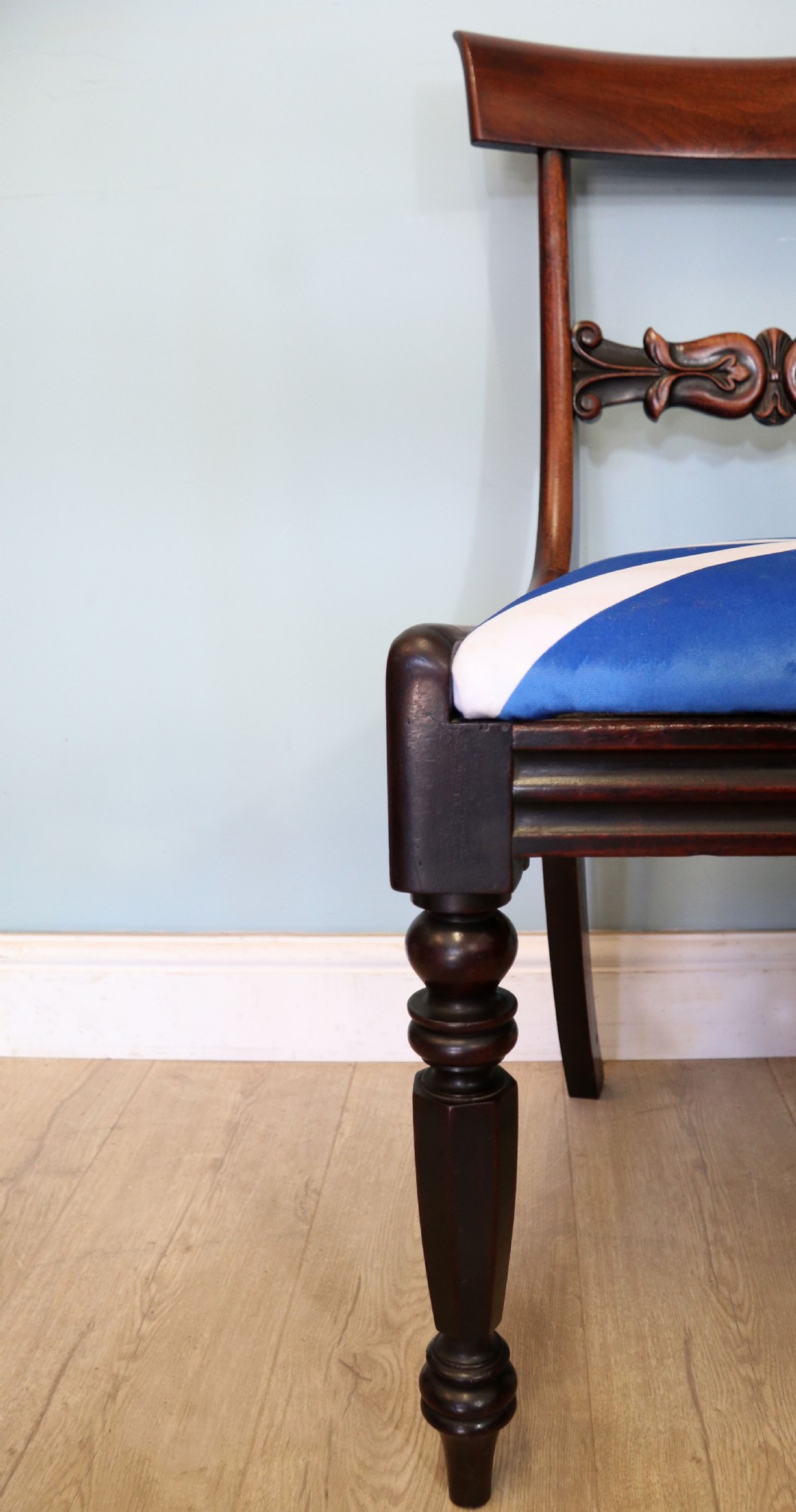 A set of four Victorian mahogany bar-back dining chairs with carved mid-rails, turned front legs, and flag-patterned upholstered seats. View XXII