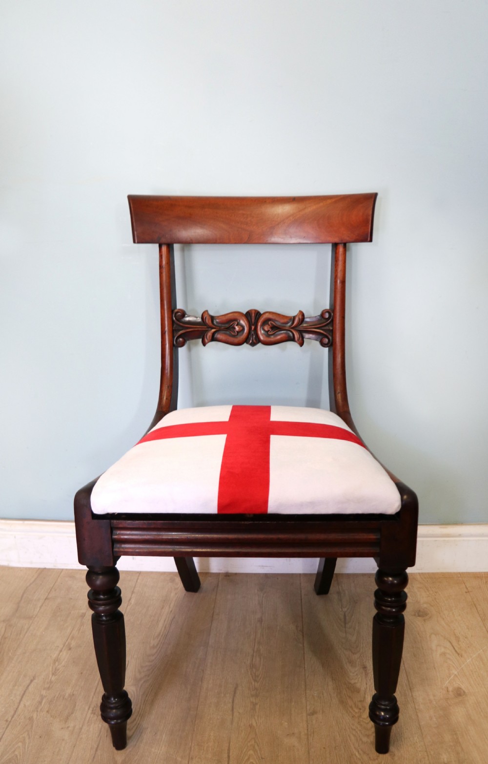 A set of four Victorian mahogany bar-back dining chairs with carved mid-rails, turned front legs, and flag-patterned upholstered seats. View XXIII