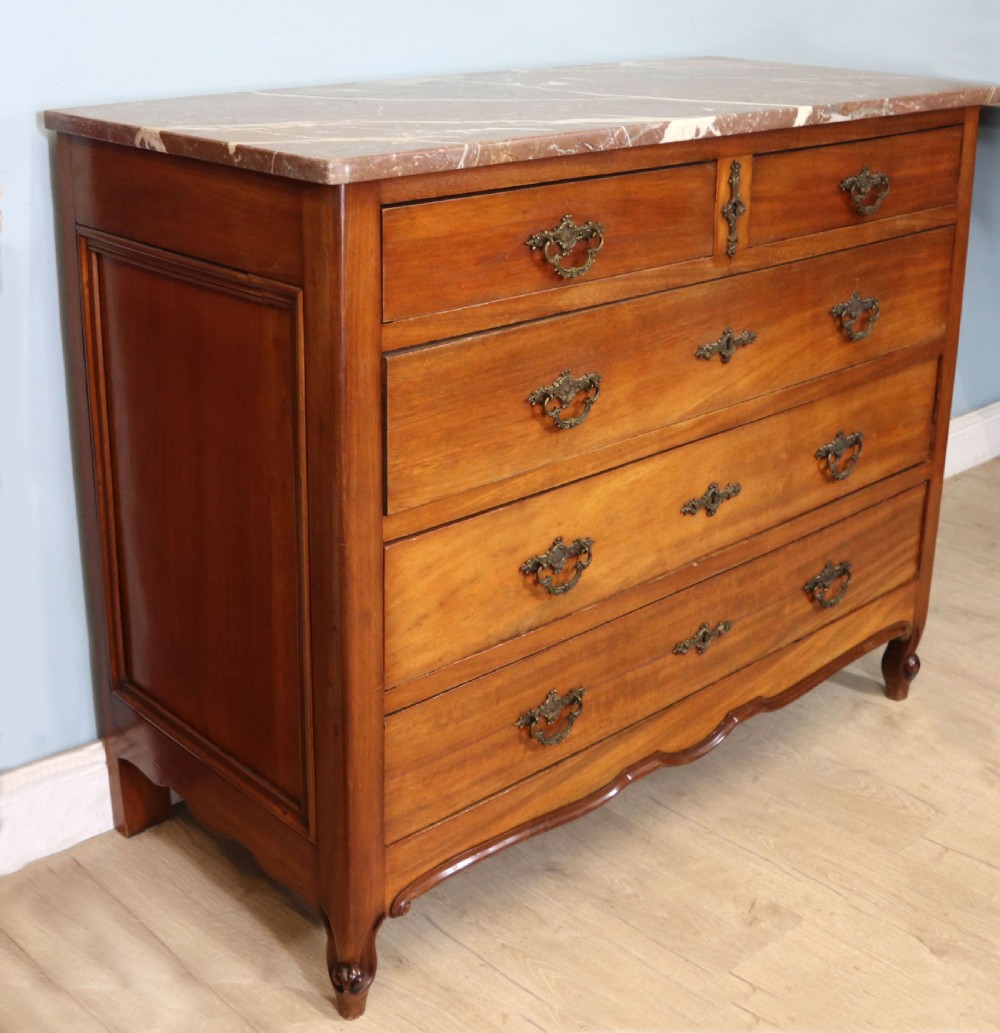 A lovely late 19th century French walnut marble topped chest. View III