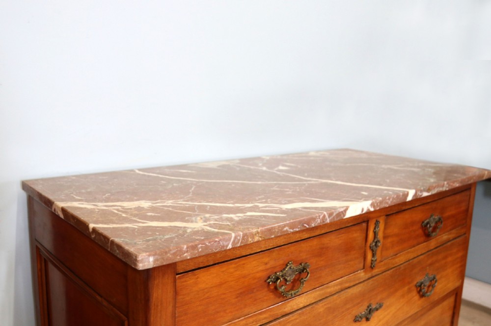 A lovely late 19th century French walnut marble topped chest. View V