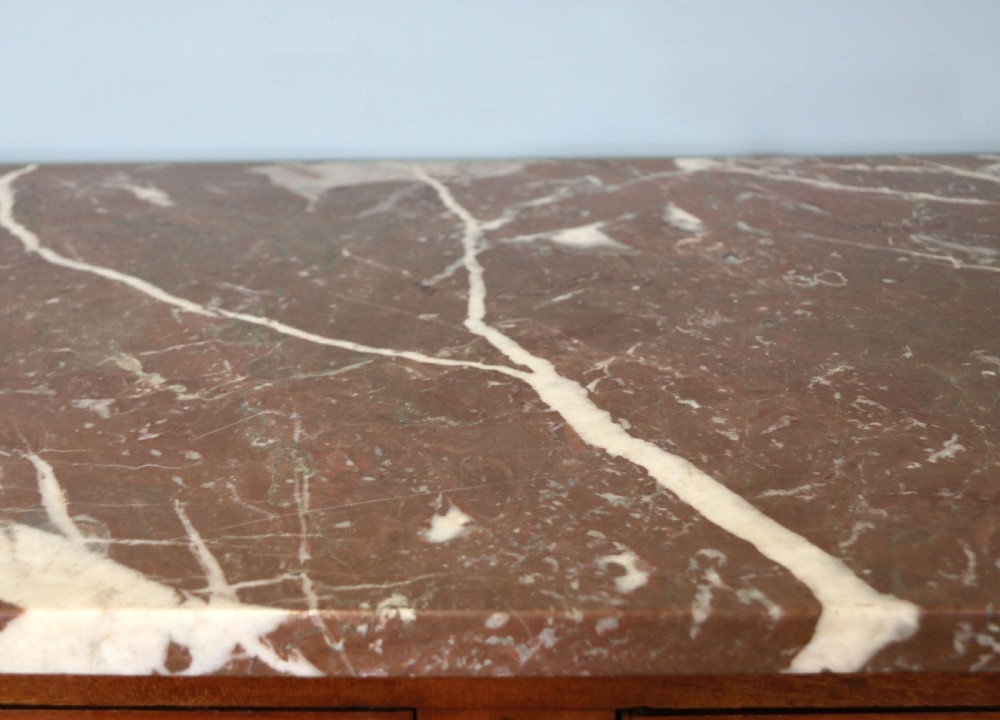 A lovely late 19th century French walnut marble topped chest. View VI