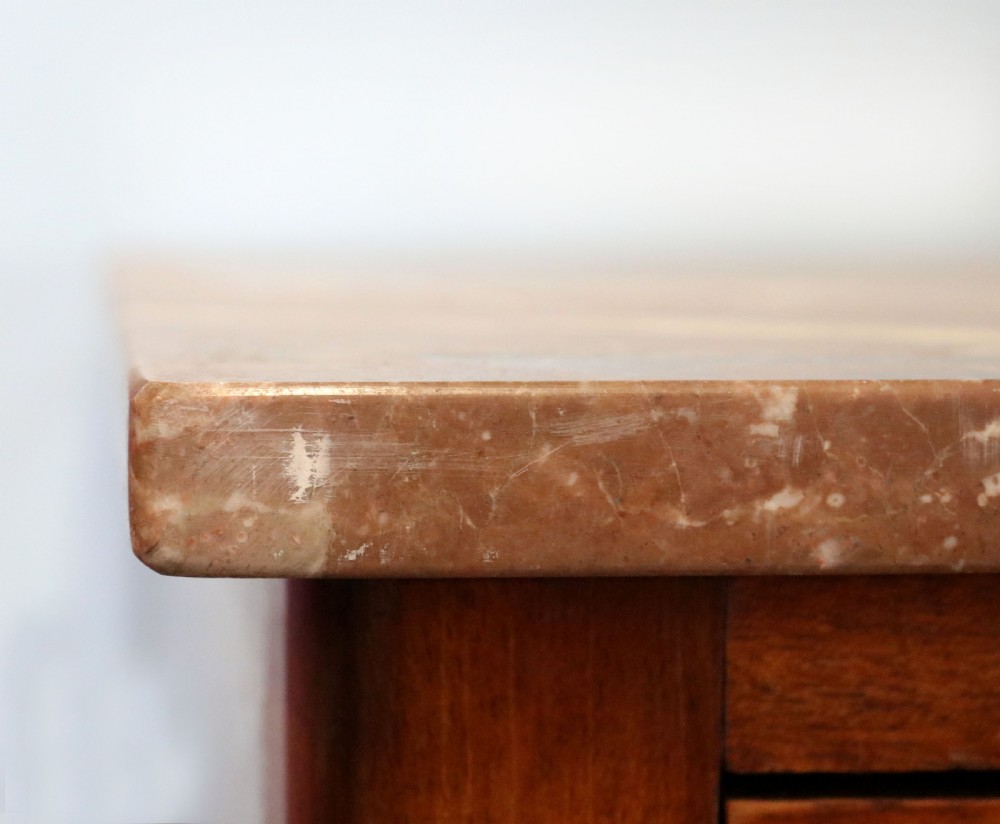 A lovely late 19th century French walnut marble topped chest. View VII