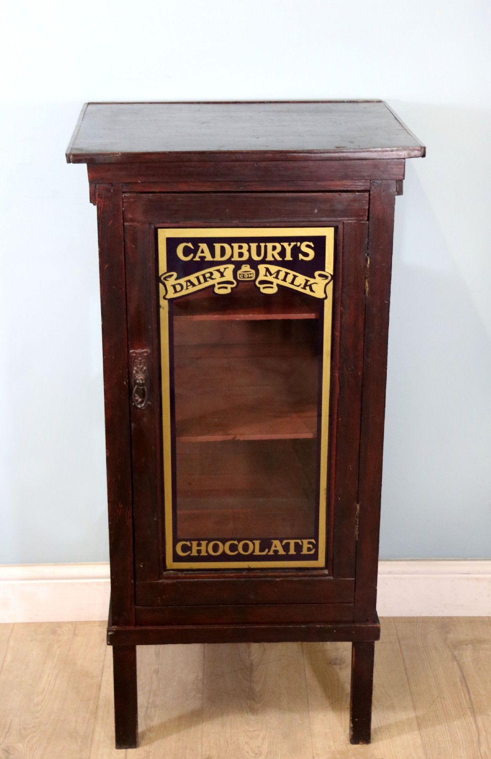  A lovely well used shop cabinet sign written Cadbury's Chocolate. View II