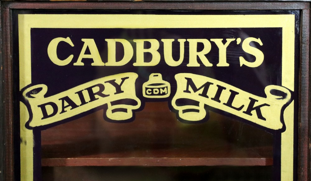 A lovely well used shop cabinet sign written Cadbury's Chocolate. View IX