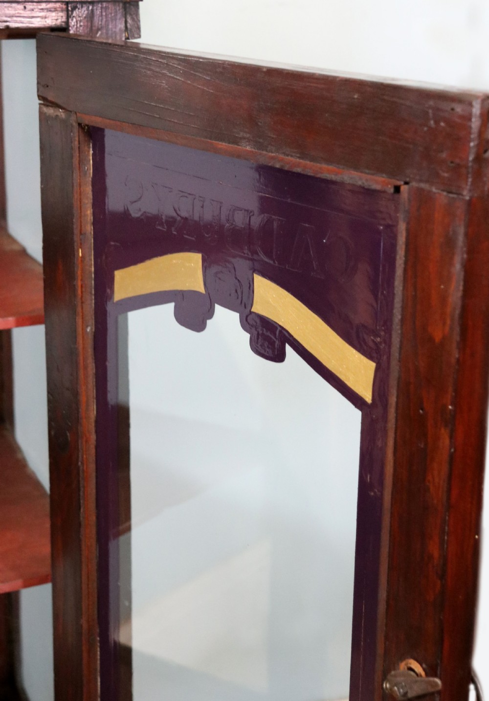  A lovely well used shop cabinet sign written Cadbury's Chocolate. View XIII