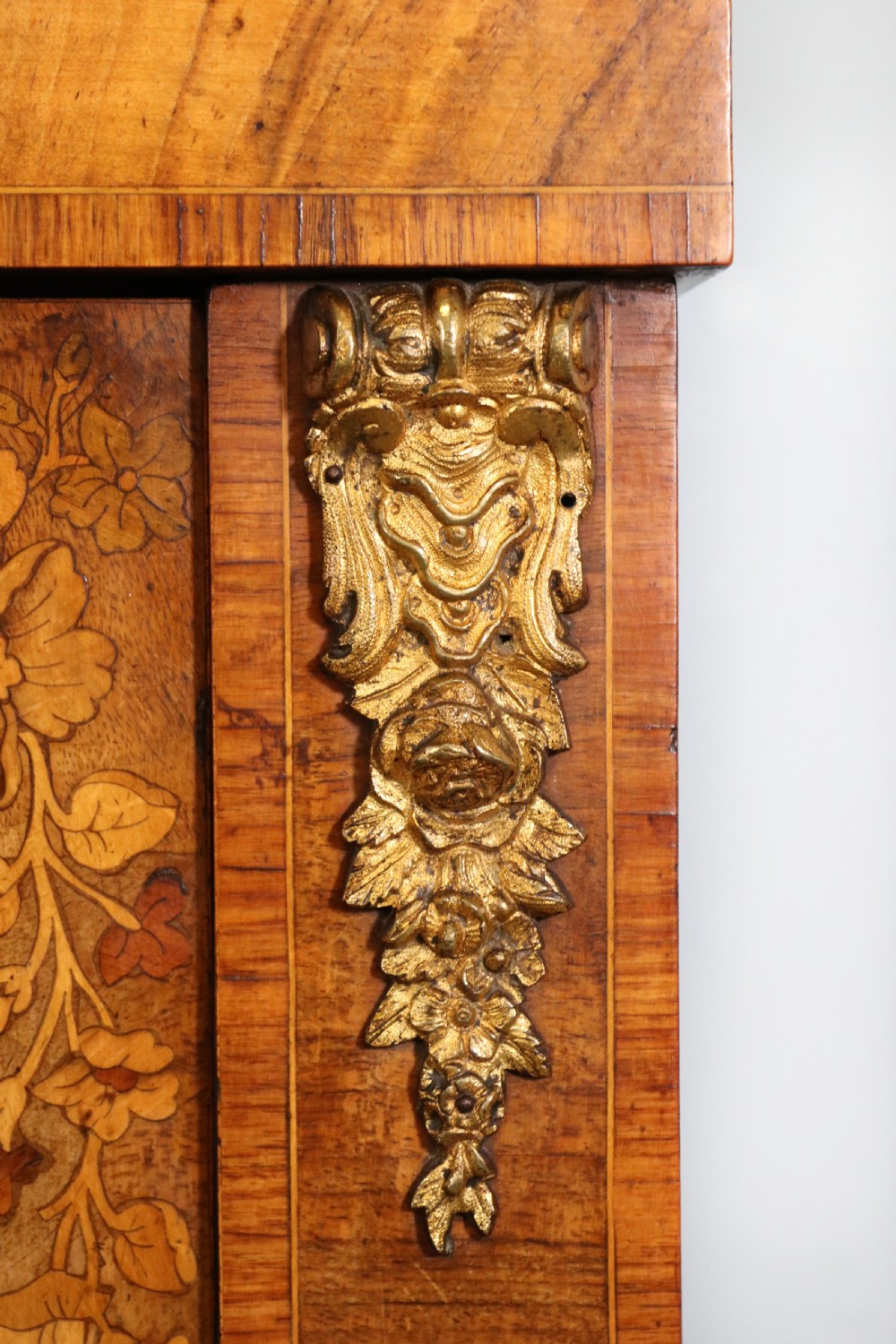 A lovely Victorian walnut and floral inlaid pier cabinet, later sign written in French with Champagne advertising. View XI