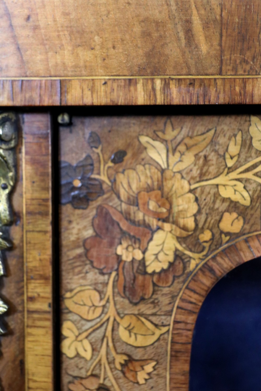 A lovely Victorian walnut and floral inlaid pier cabinet, later sign written in French with Champagne advertising. View XIII
