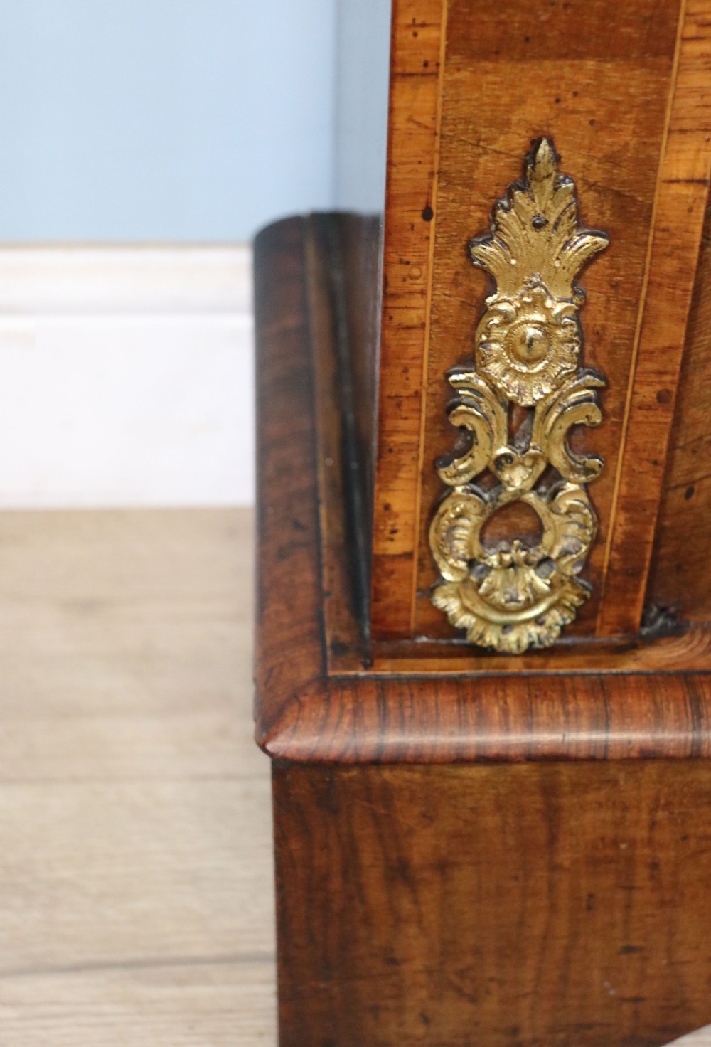 A lovely Victorian walnut and floral inlaid pier cabinet, later sign written in French with Champagne advertising. View XXVII