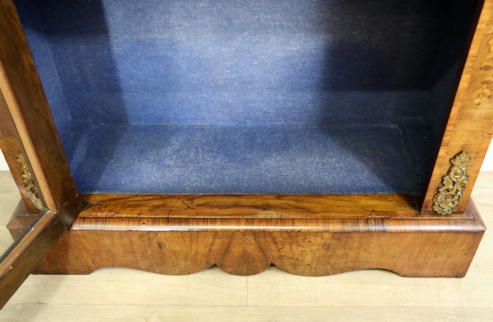 A lovely Victorian walnut and floral inlaid pier cabinet, later sign written in French with Champagne advertising. View XXIX