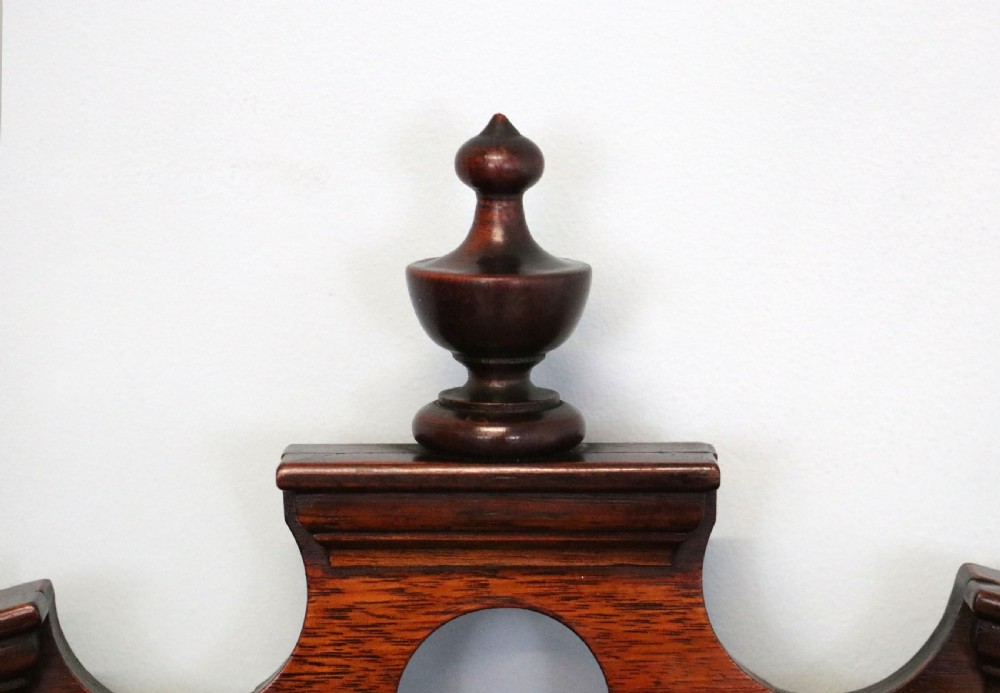 A late 19th century American walnut pedestal chest. View VIII