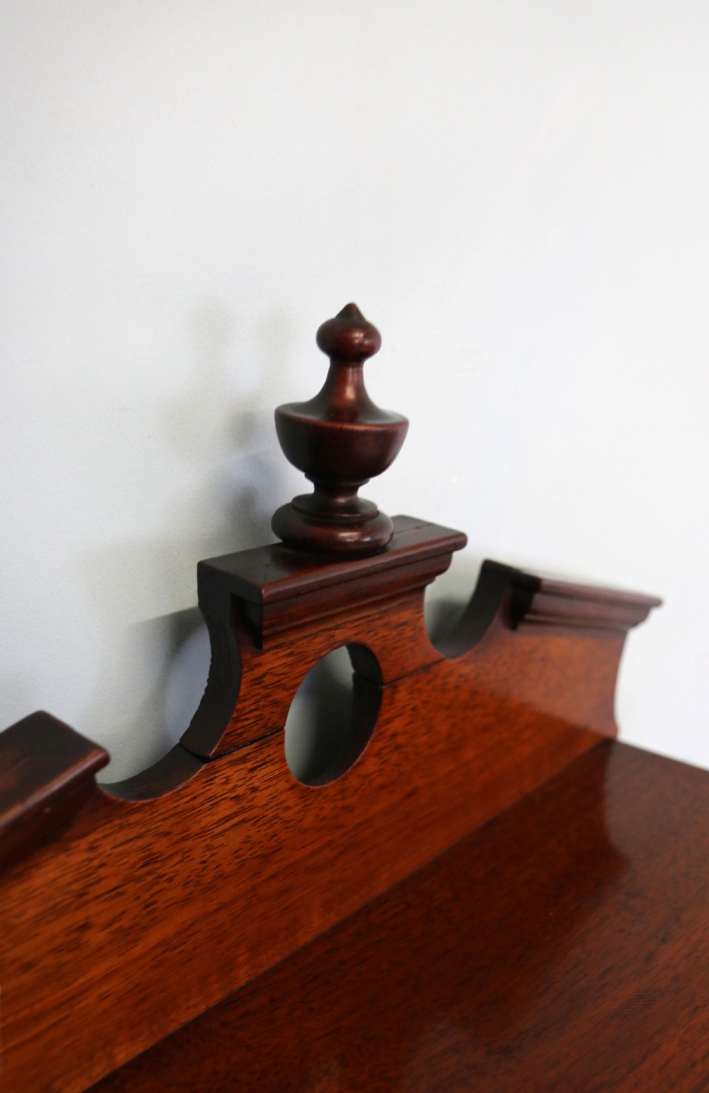 A late 19th century American walnut pedestal chest. View X