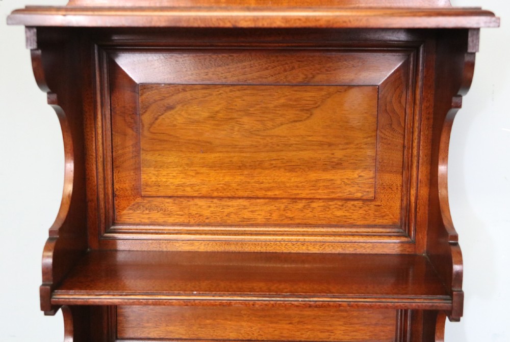 A late 19th century American walnut pedestal chest. View XIII