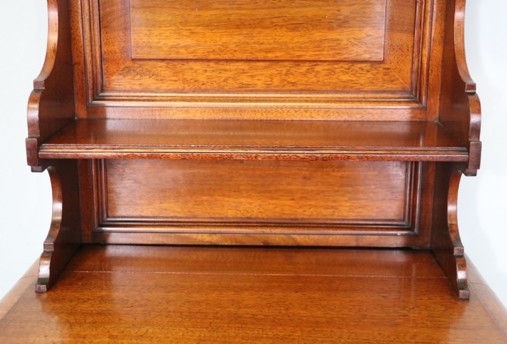 A late 19th century American walnut pedestal chest. View XIV