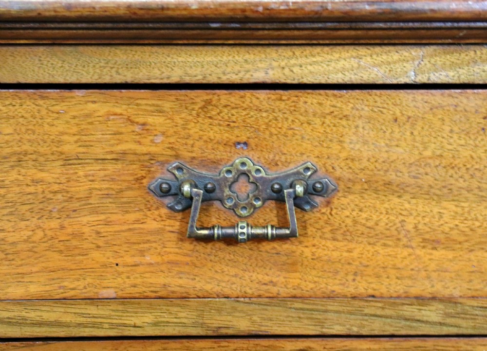 A late 19th century American walnut pedestal chest. View XVI