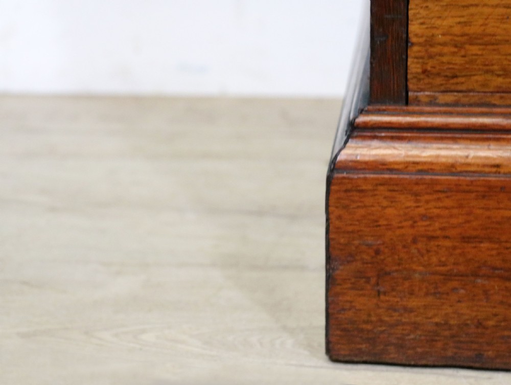 A late 19th century American walnut pedestal chest. View XX
