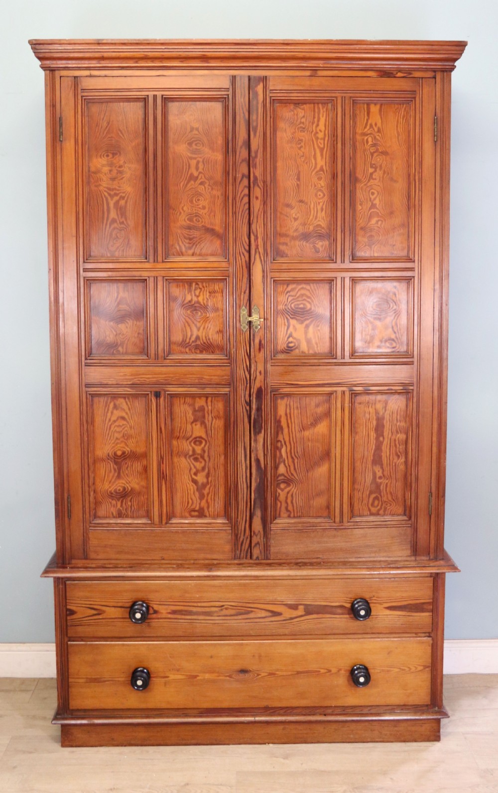 A late 19th century pitch pine wardrobe.