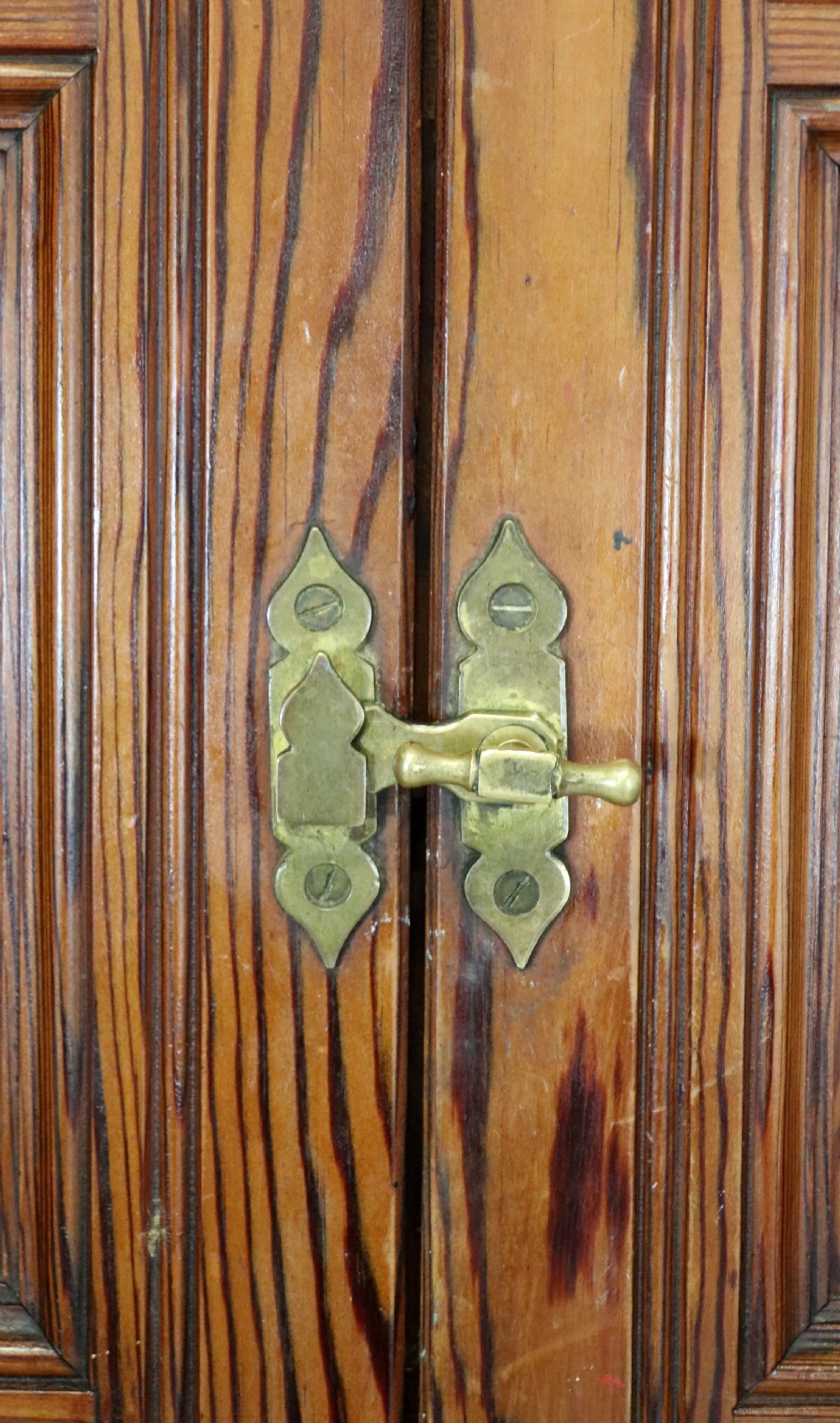 A late 19th century pitch pine wardrobe. View VIII