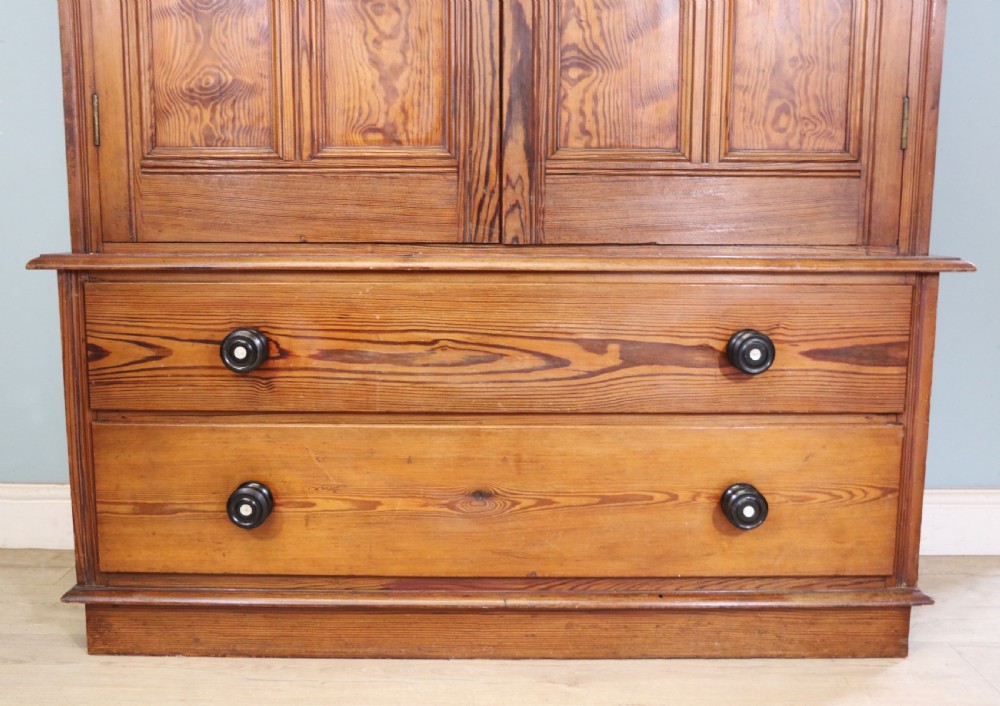 A late 19th century pitch pine wardrobe. View XVI