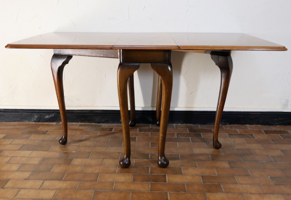 A lovely Queen Anne revival drop leaf dining table. View II