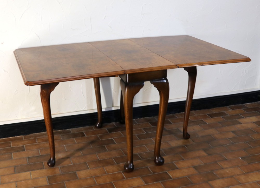  A lovely Queen Anne revival drop leaf dining table. View III