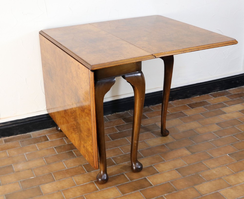  A lovely Queen Anne revival drop leaf dining table. View V