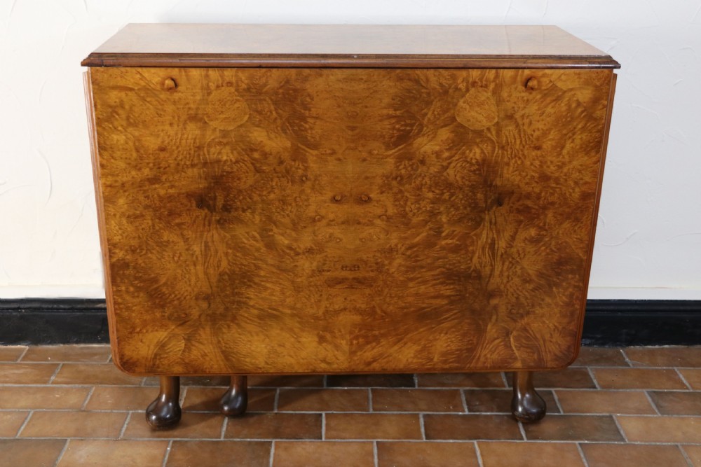  A lovely Queen Anne revival drop leaf dining table. View VI