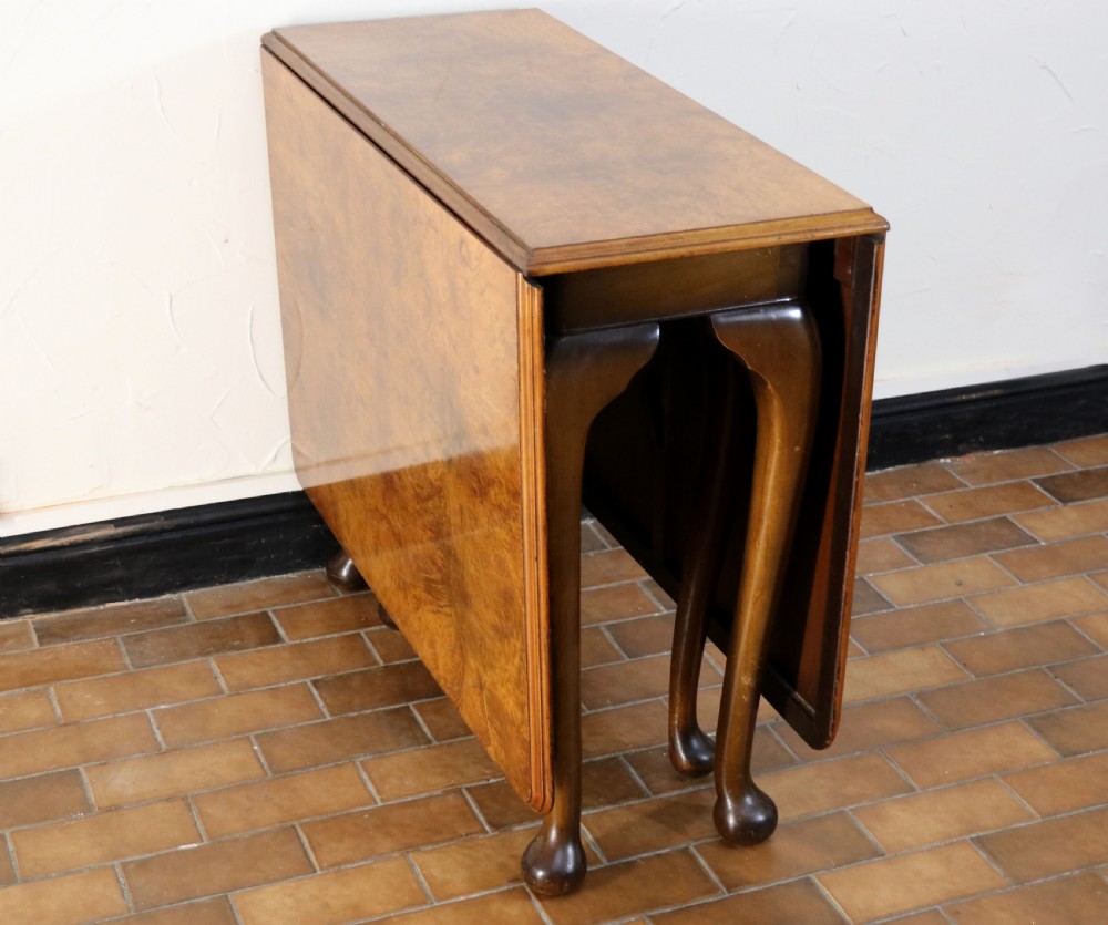  A lovely Queen Anne revival drop leaf dining table. View X