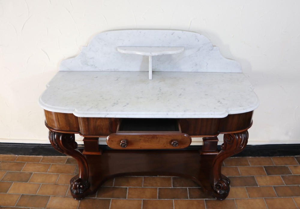  A lovely London Victorian duchess washstand has a marble top. View V