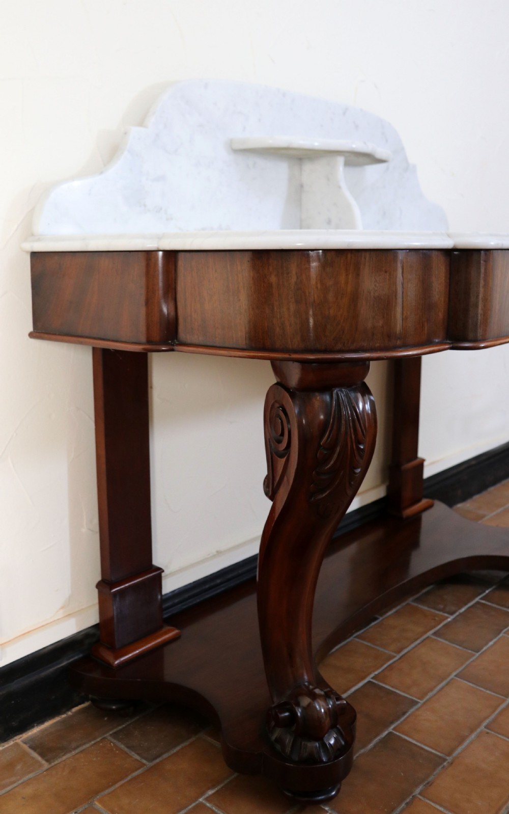  A lovely London Victorian duchess washstand has a marble top. View X