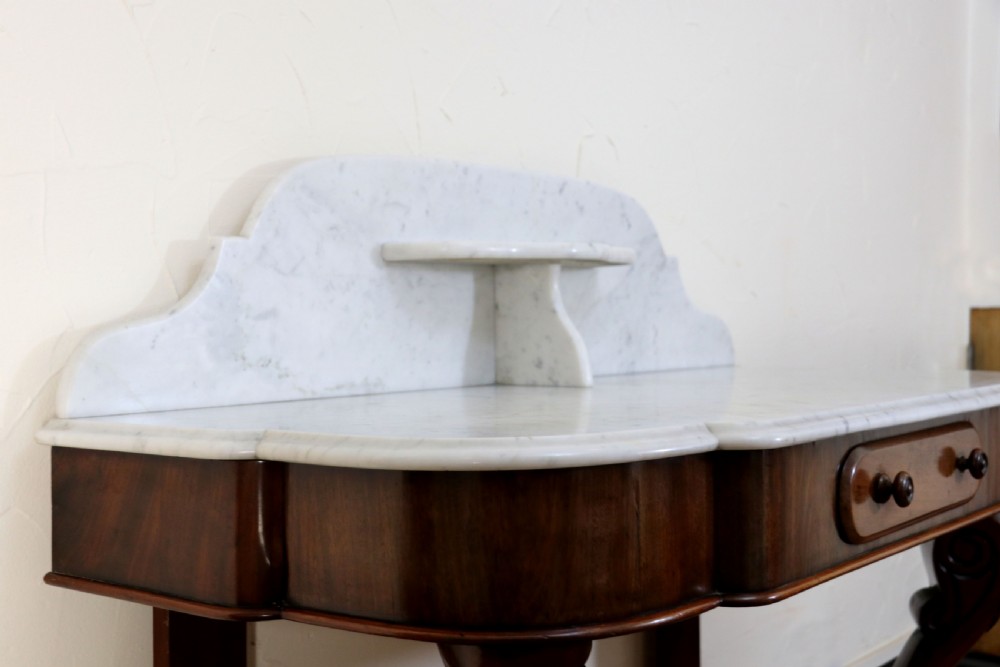  A lovely London Victorian duchess washstand has a marble top. View XI