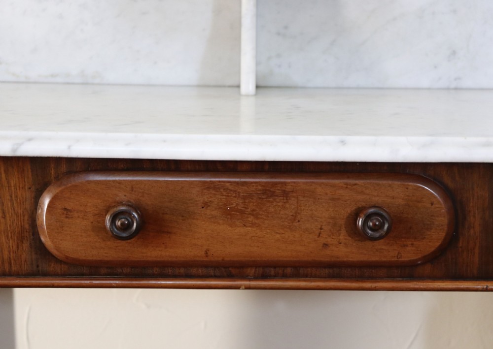  A lovely London Victorian duchess washstand has a marble top. View XIV
