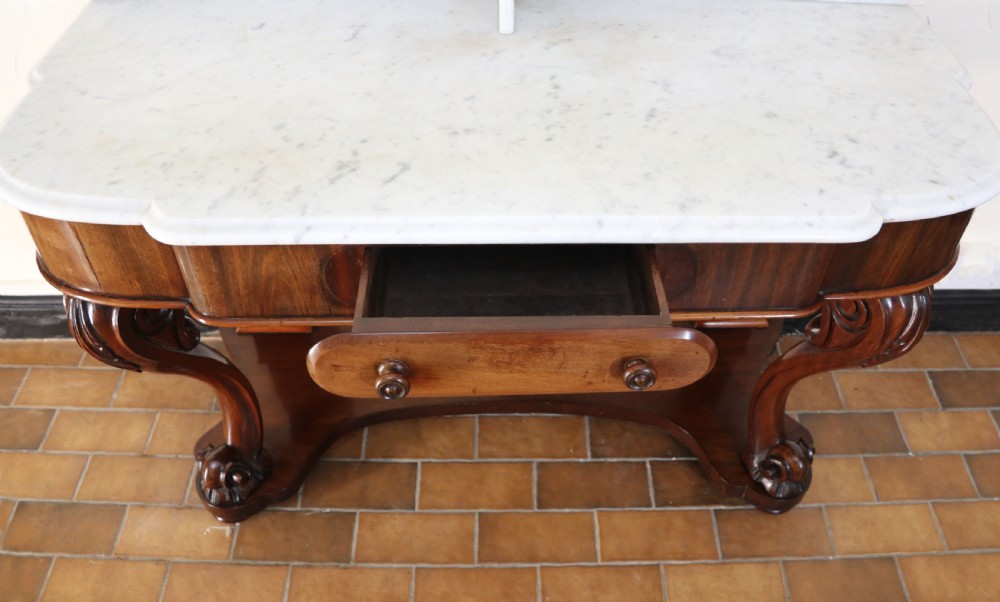  A lovely London Victorian duchess washstand has a marble top. View XV