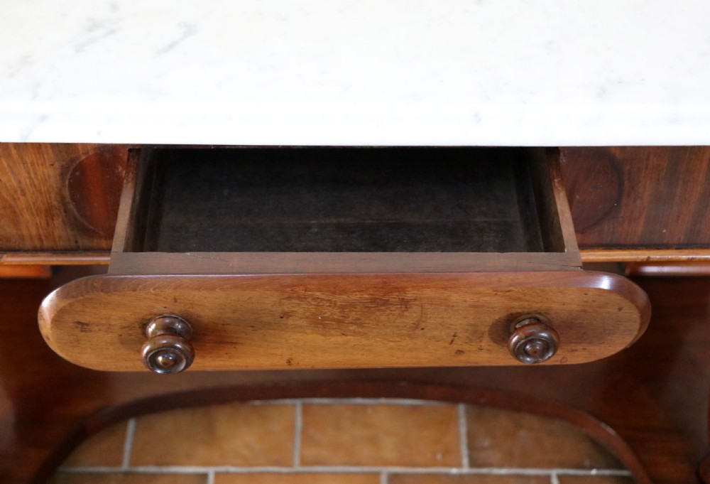  A lovely London Victorian duchess washstand has a marble top. View XVI