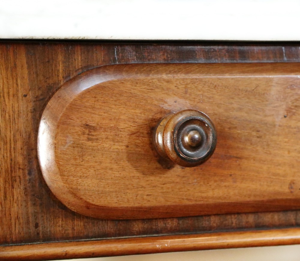  A lovely London Victorian duchess washstand has a marble top. View XVIII