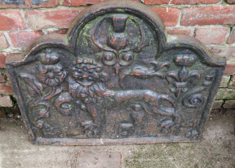 A cast iron fire back in the medieval style with passant guardant leopard. View III