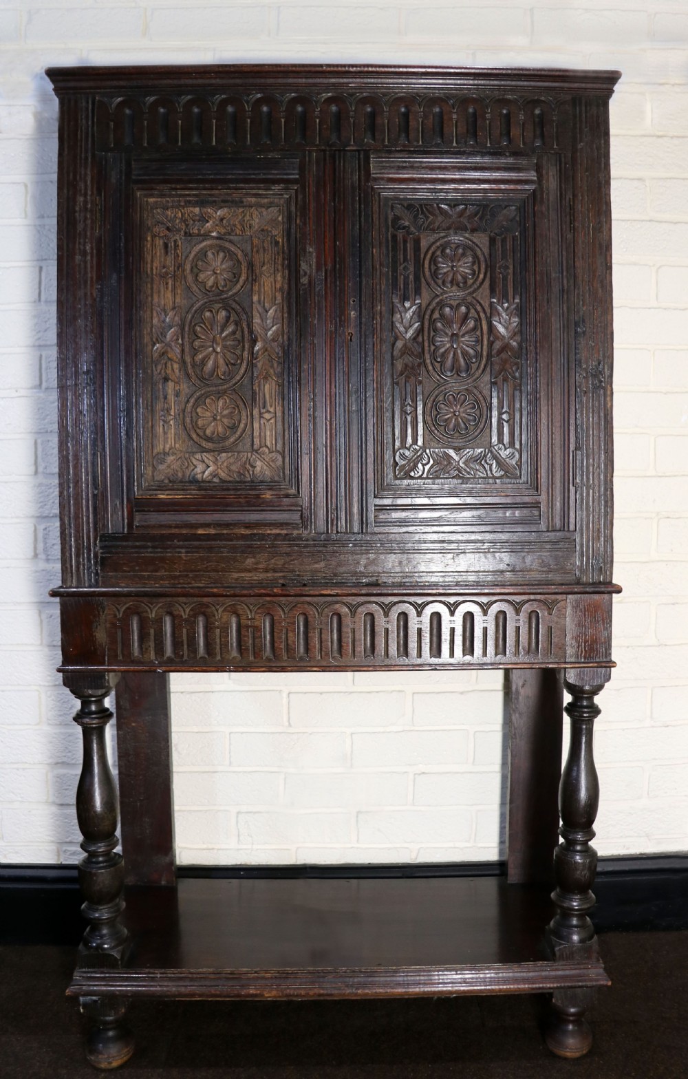 A lovely Victorian gothic revival cabinet on stand. View II