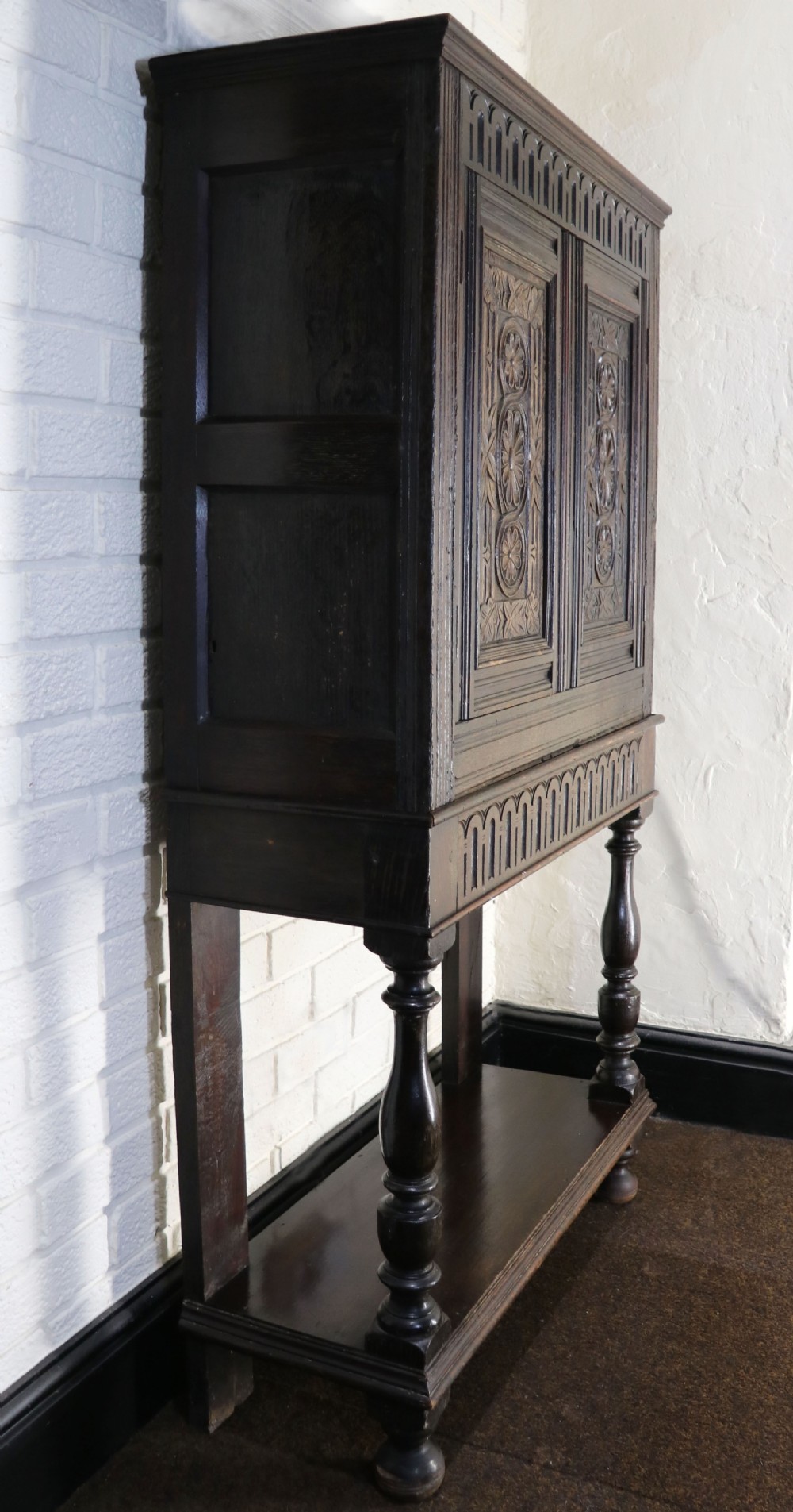 A lovely Victorian gothic revival cabinet on stand. View IV