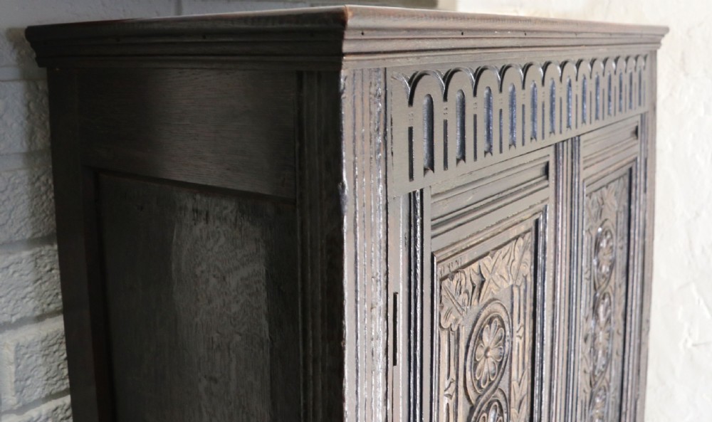 A lovely Victorian gothic revival cabinet on stand. View X