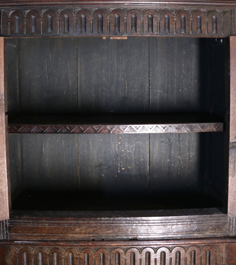 A lovely Victorian gothic revival cabinet on stand. View XVII