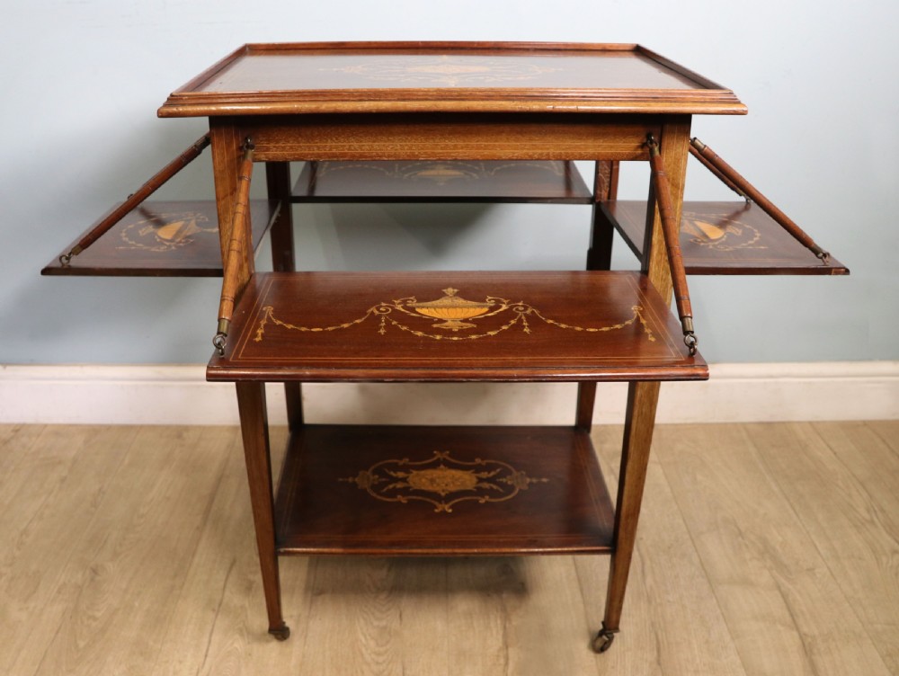 A lovely Edwardian metamorphic combination side table.