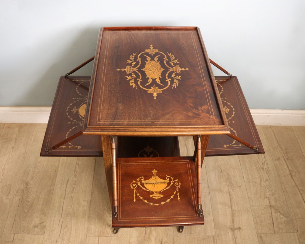 A lovely Edwardian metamorphic combination side table. View V