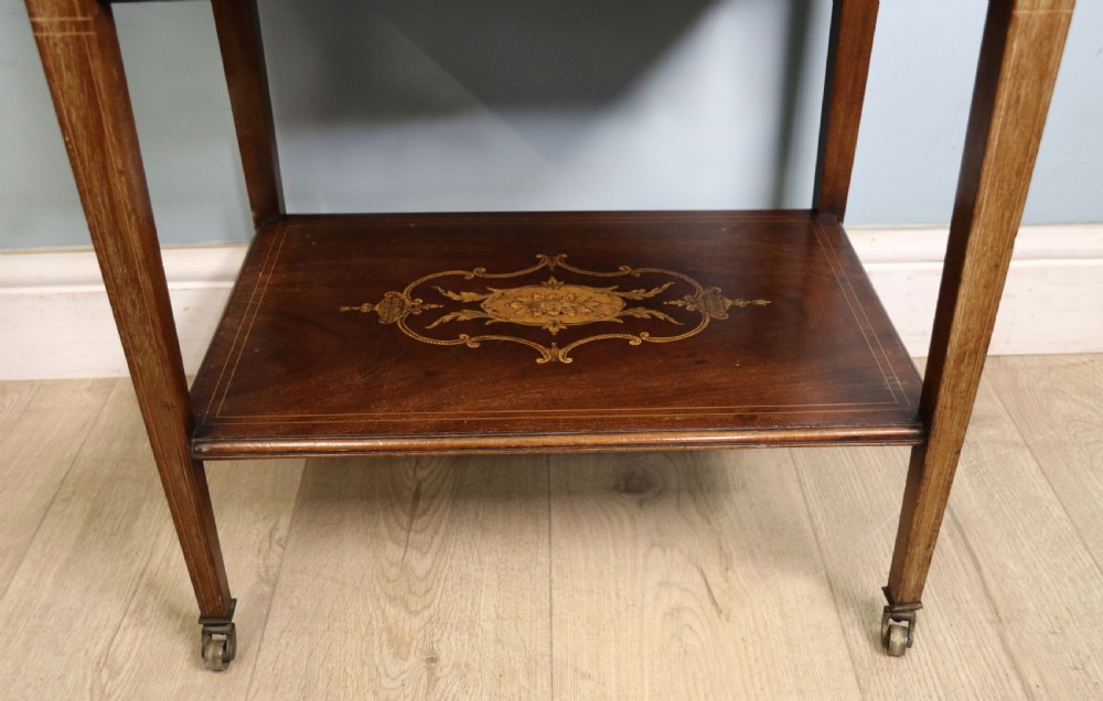 A lovely Edwardian metamorphic combination side table. View XXVI