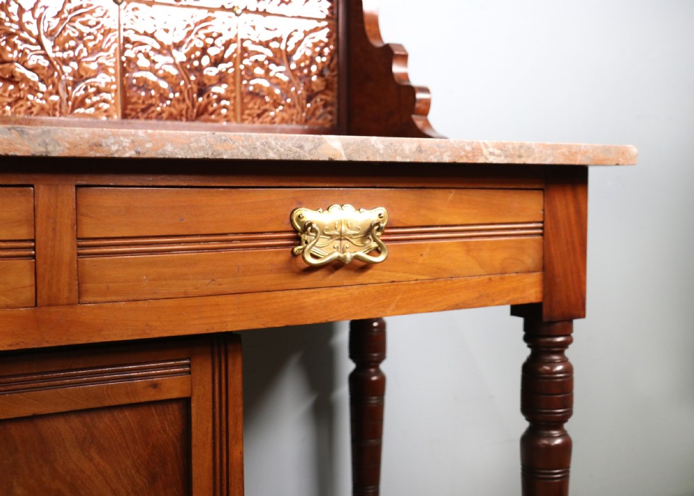 A late Victorian mahogany framed washstand. View XVI