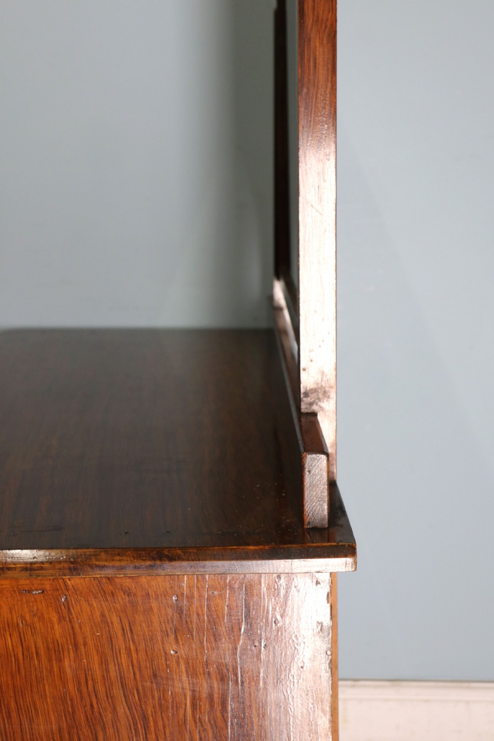 A dark mahogany Victorian dressing chest featuring a rectangular pivoting top mirror and four drawers with metal drop handles. View VIII