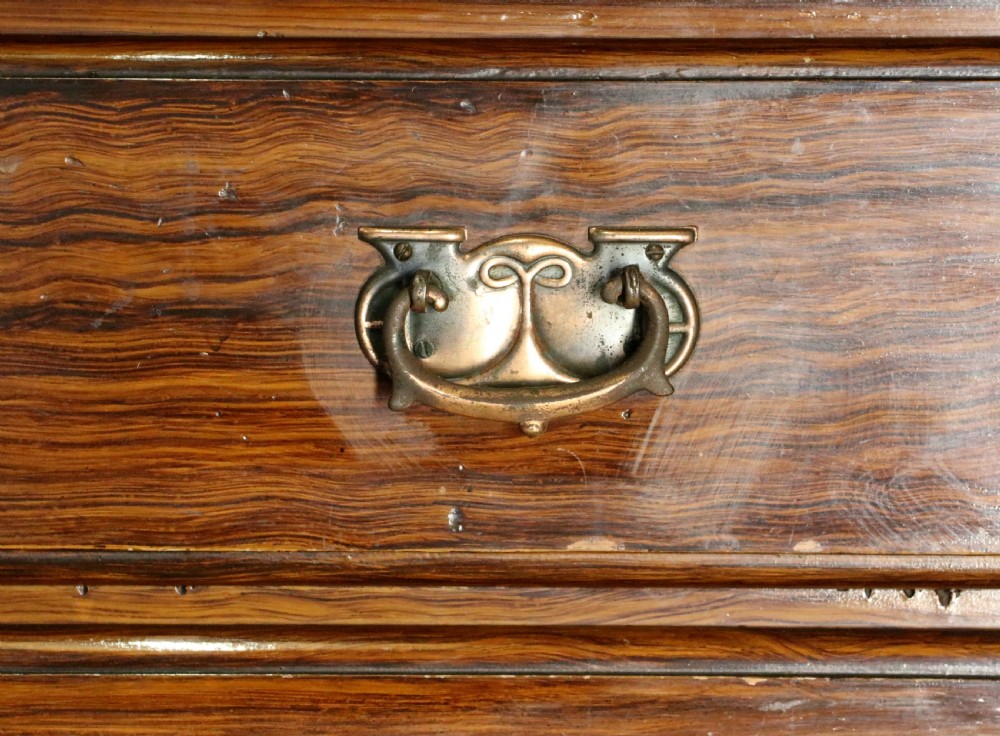 A dark mahogany Victorian dressing chest featuring a rectangular pivoting top mirror and four drawers with metal drop handles. View XII