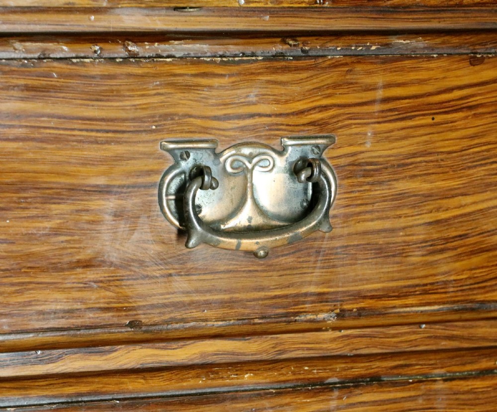 A dark mahogany Victorian dressing chest featuring a rectangular pivoting top mirror and four drawers with metal drop handles. View XIII