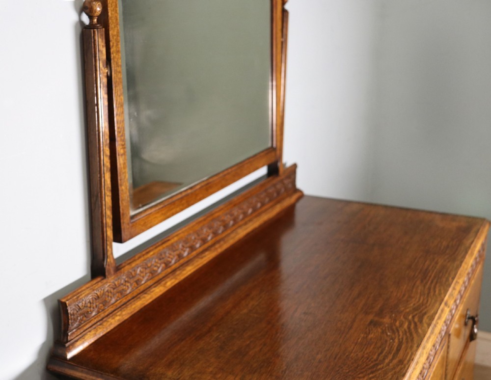 A lovely early 20th century oak dressing chest!. View VII