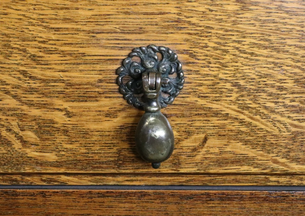 A lovely early 20th century oak dressing chest!. View XII